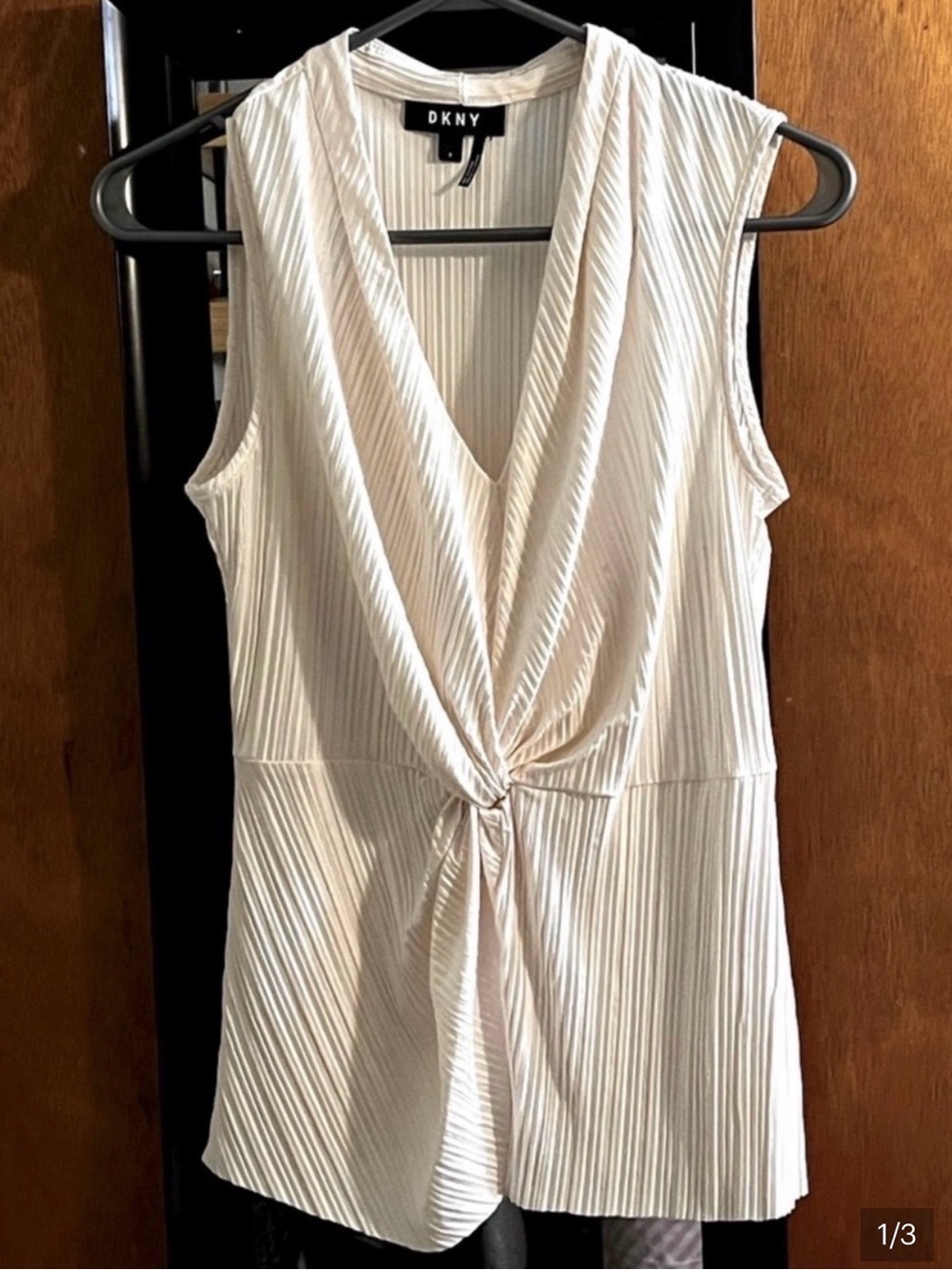 DKNY Plissé Front-Twist Sleeveless Blouse in a soft cream colour size small